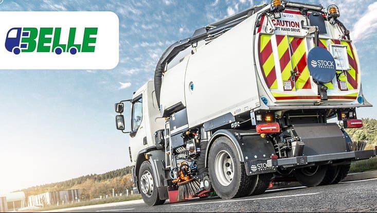 Mülllaster mit BELLE-Logo